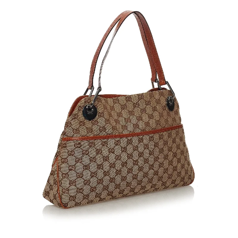 Women Gucci bags with interlocking G hardware for a classic lookGucci GG Canvas Eclipse Shoulder Bag (34757)