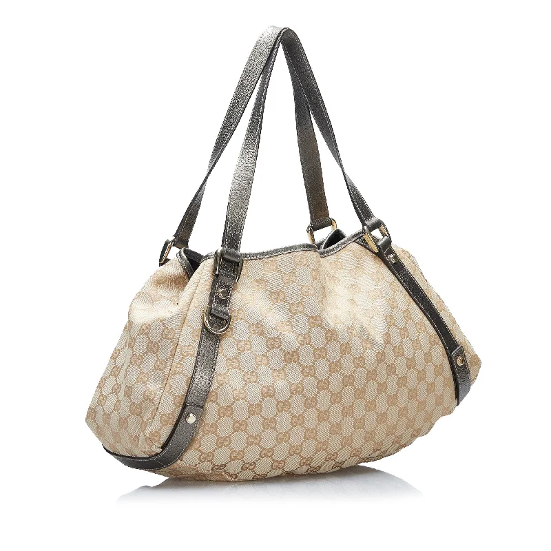 Ladies Gucci shoulder bags with a magnetic - closure flapBrown Gucci GG Canvas Abbey Tote