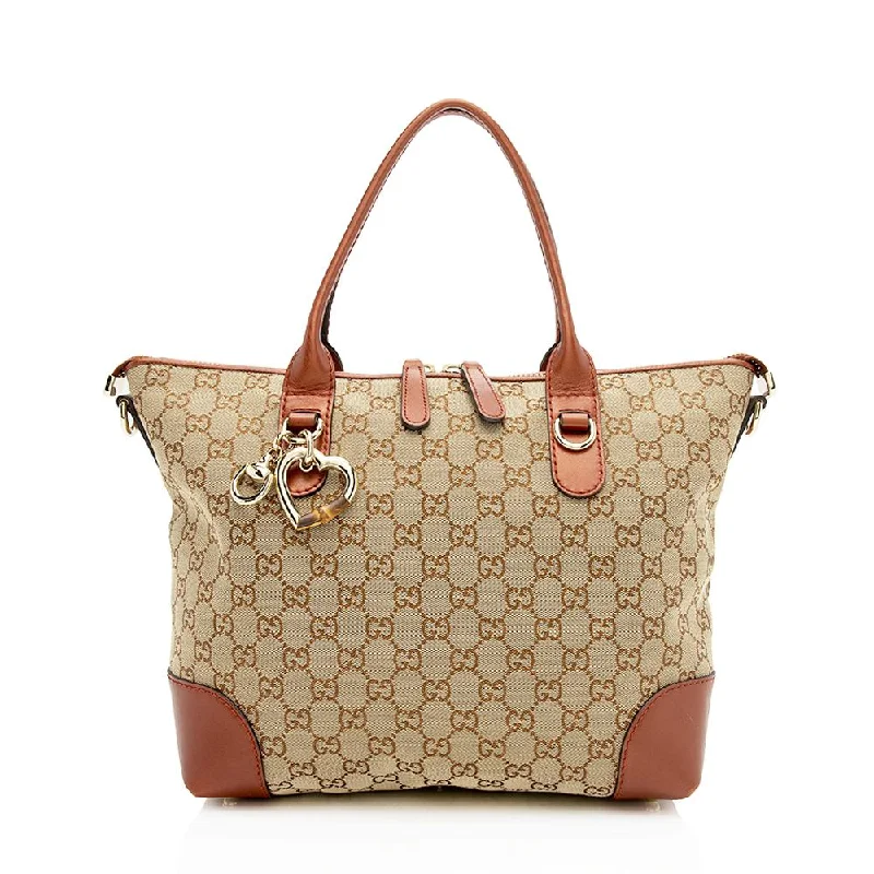 Gucci backpacks for women with a multi - pocket designGucci GG Canvas Heart Bit Medium Tote (SHF-12715)