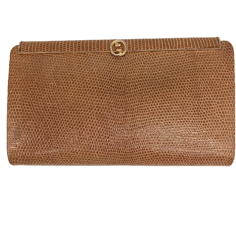 Women Gucci bags with a magnetic snap closure for easy accessVintage Gucci Clutch