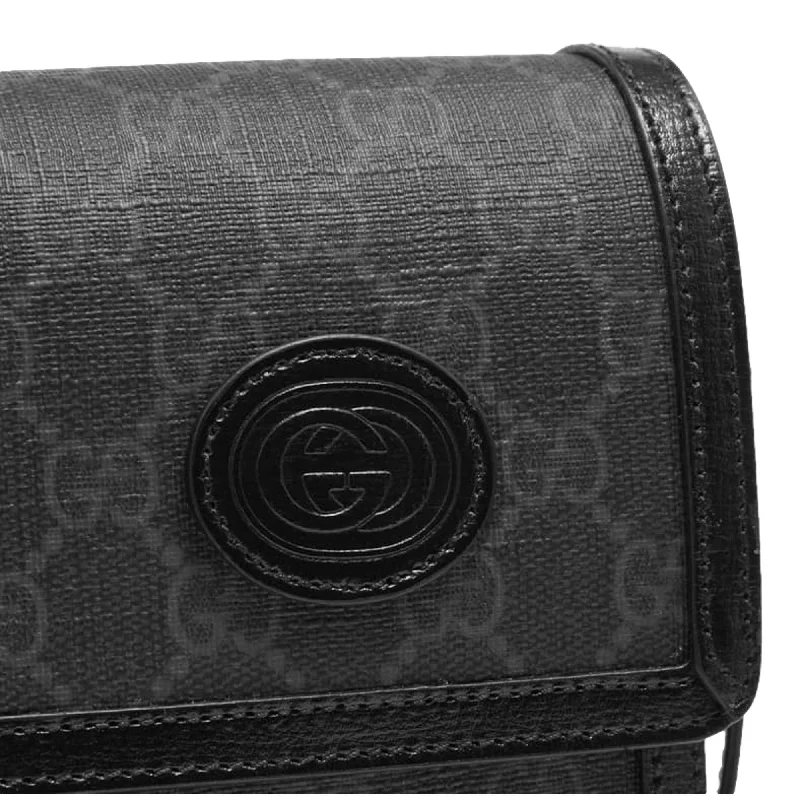 Gucci Marmont bags for women with a contrast - colored interiorGucci GG Retro Printed Black Canvas Crossbody Minibag