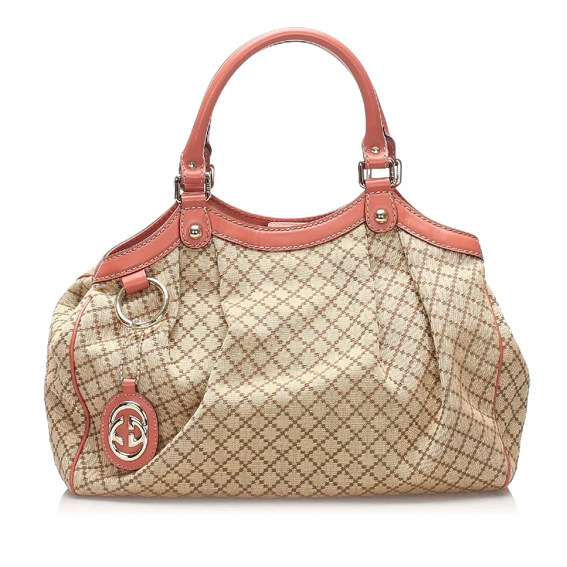 Ladies Gucci Dionysus bags in a pastel colorGucci Diamante Sukey Canvas Tote Bag (SHG-11104)