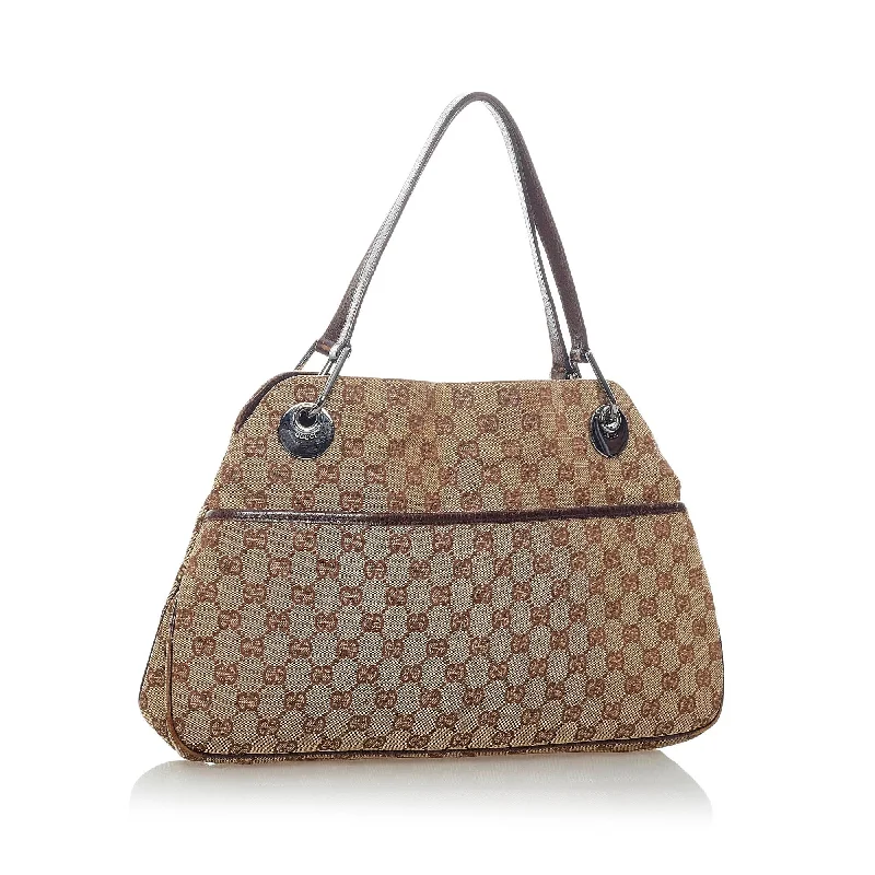 Gucci Marmont bags for women with quilted leather exteriorsGucci GG Canvas Eclipse Shoulder Bag (32020)