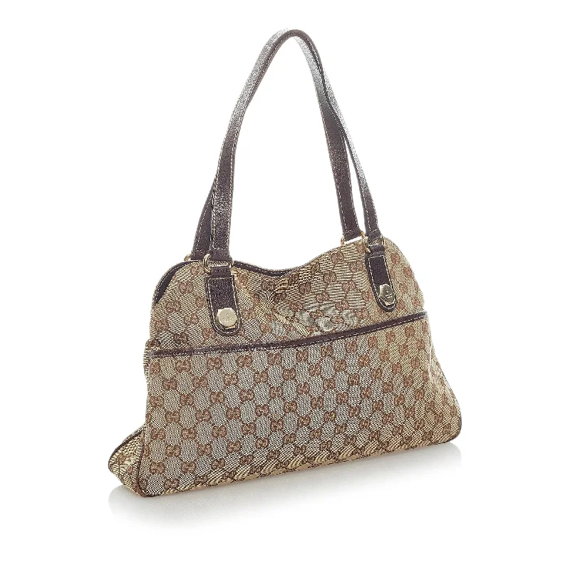 Women Gucci crossbody bags with a woven leather strapGucci GG Canvas Eclipse Shoulder Bag (34655)