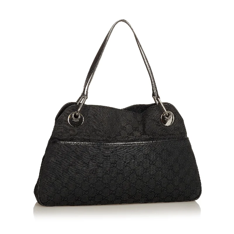 Women Gucci bags with interlocking G hardware for a classic lookGucci GG Canvas Eclipse Shoulder Bag (26385)