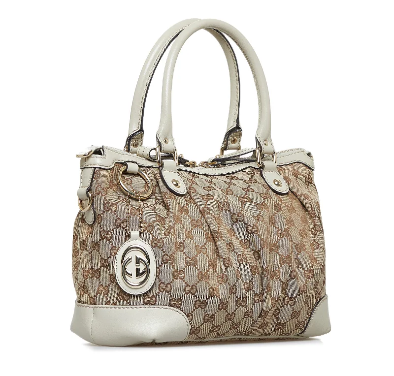 Women Gucci bags with a detachable mirror insideBrown Gucci GG Canvas Sukey Tote Bag