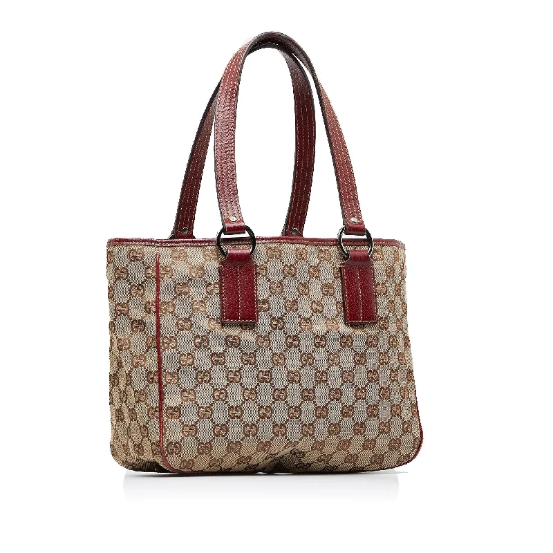 Gucci tote bags for women with a spacious interiorGucci GG Canvas Handbag (SHG-NeMEXz)