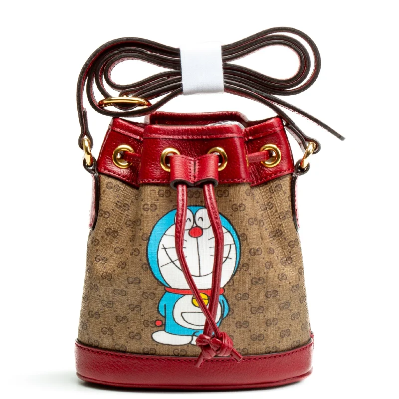 Gucci handbags for women with a back - zip pocketGUCCI x Doreamon Candy GG Mini Bucket Bag