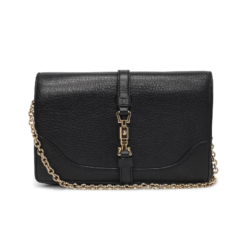 Ladies Gucci shoulder bags with a tassel decorationGucci Black Pebbled Calfskin Broadway Evening Bag