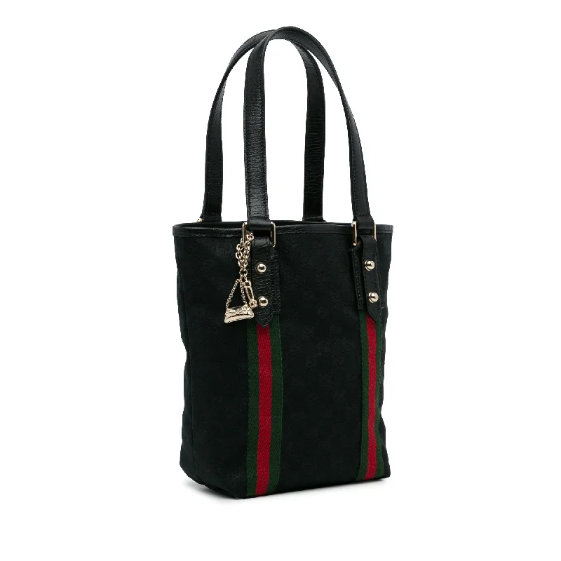 Ladies Gucci Dionysus bags with a star - shaped charmBlack Gucci GG Canvas Jolicoeur Tote Bag