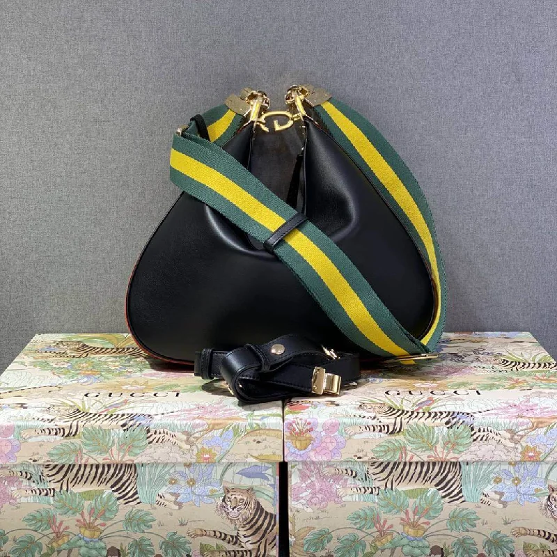 Women Gucci Sylvie bags with a monogram - embossed leatherGucci Attache small shoulder bag Black leather