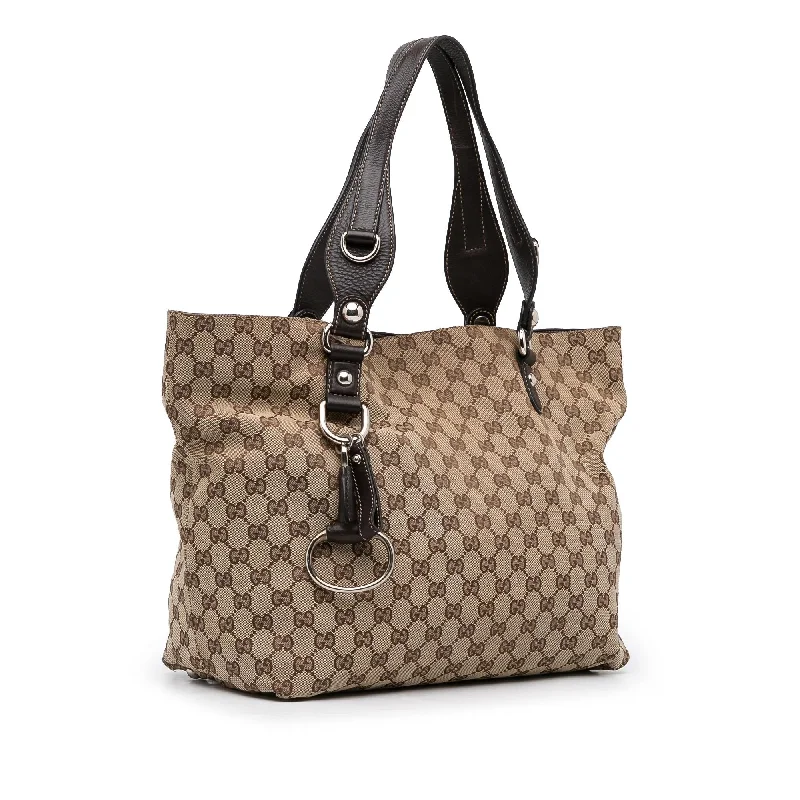 Women Gucci tote bags in GG Supreme canvas for a branded feelGucci GG Canvas Icon Bit Tote (SHG-e1bc9h)