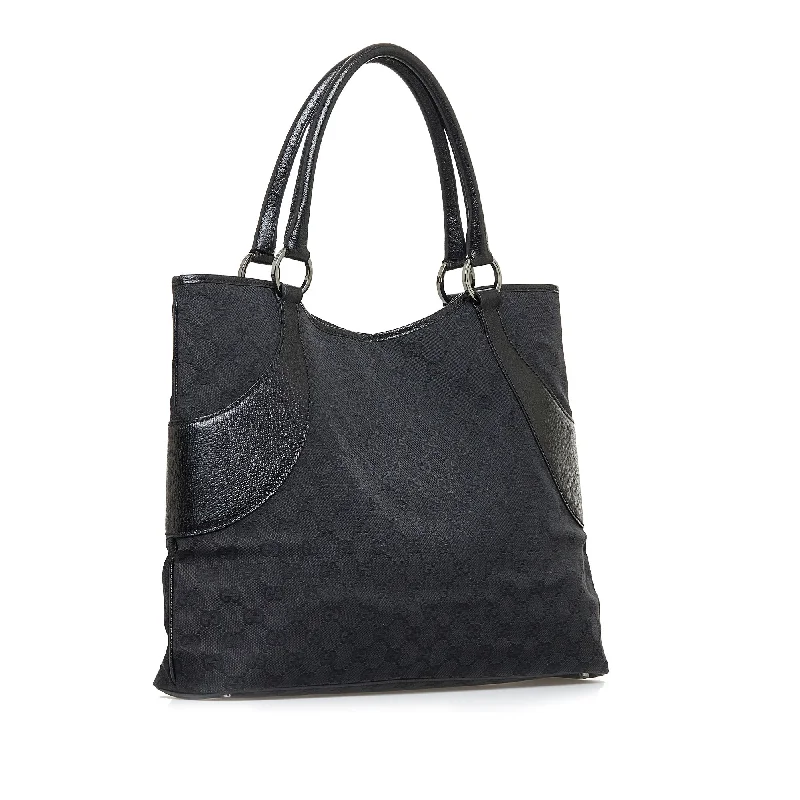 Women Gucci bags with a magnetic snap closure for easy accessBlack Gucci GG Canvas Tote Bag