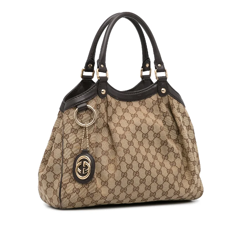 Women Gucci bags with a front - flap pocket for quick - access itemsBeige Gucci GG Canvas Sukey Tote