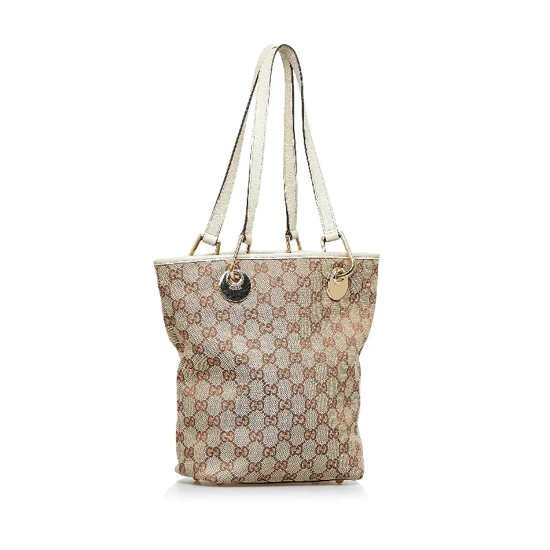 Gucci Marmont bags for women with gold - toned hardwareBrown Gucci GG Canvas Eclipse Tote Bag