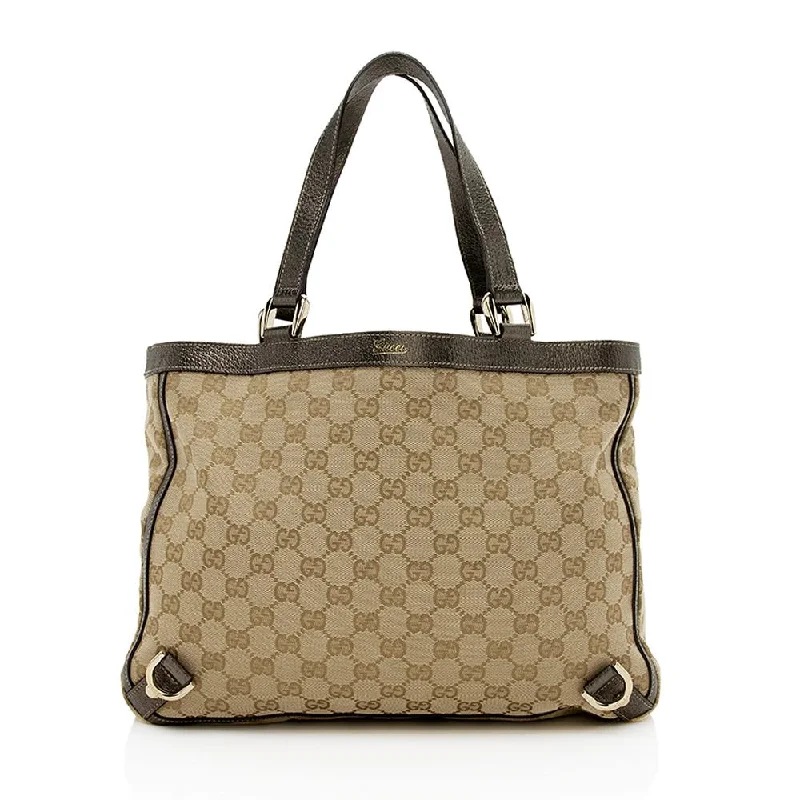 Women Gucci Sylvie bags with a monogram - embossed leatherGucci GG Canvas Abbey Medium Tote (SHF-12202)