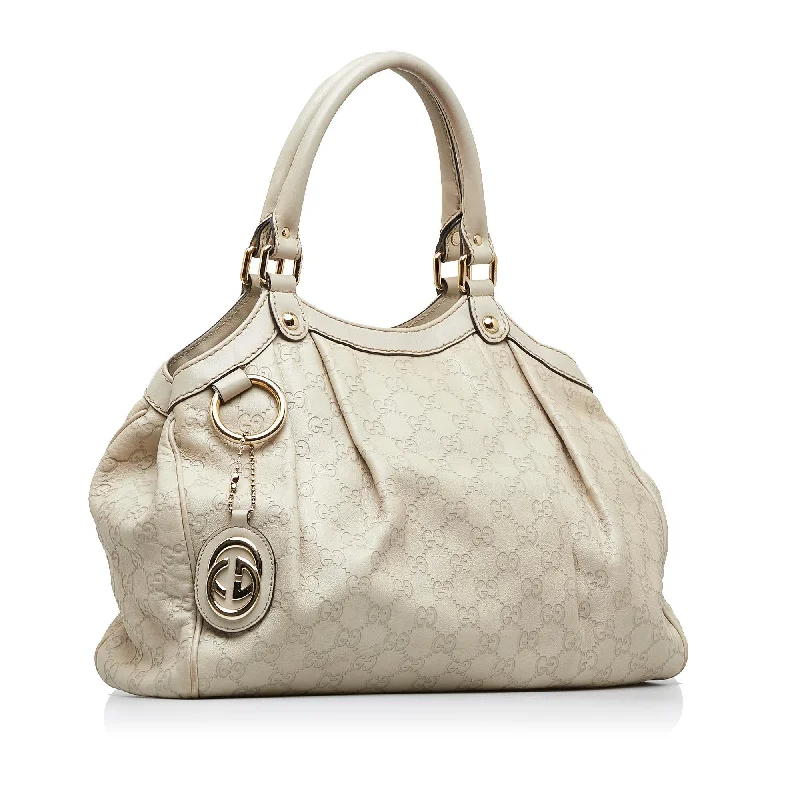 Women Gucci Sylvie bags featuring the signature web stripeGucci Guccissima Sukey (SHG-oQgthZ)