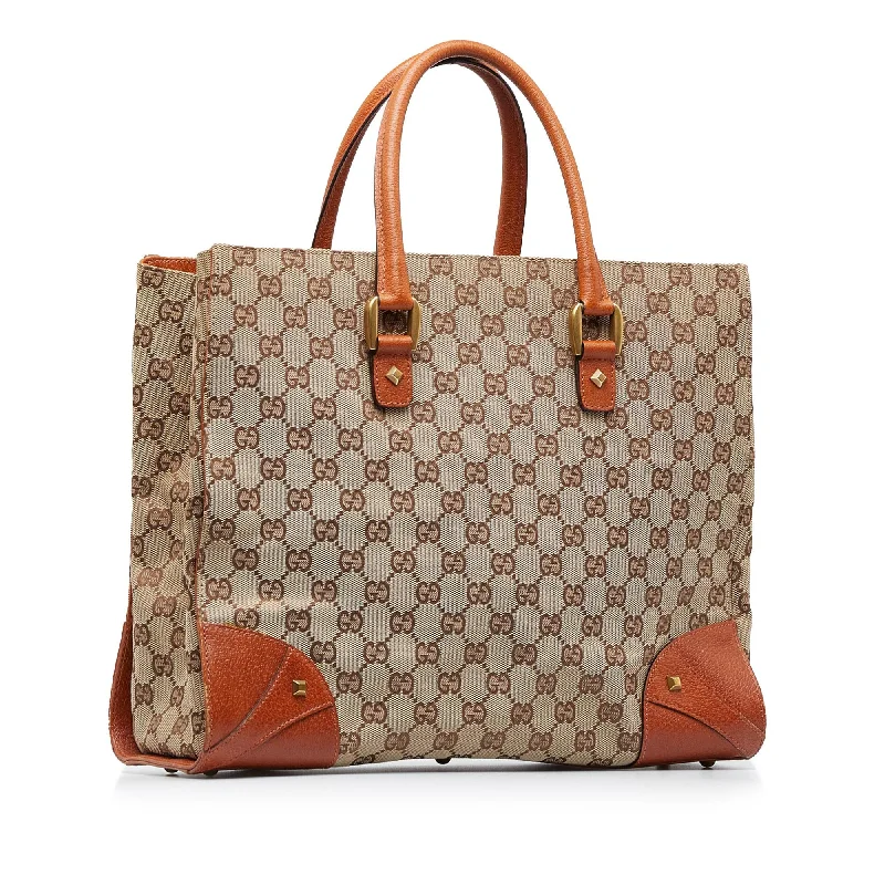 Gucci backpacks for women with a hidden back pocketGucci GG Canvas Nailhead Tote (SHG-WscBwZ)