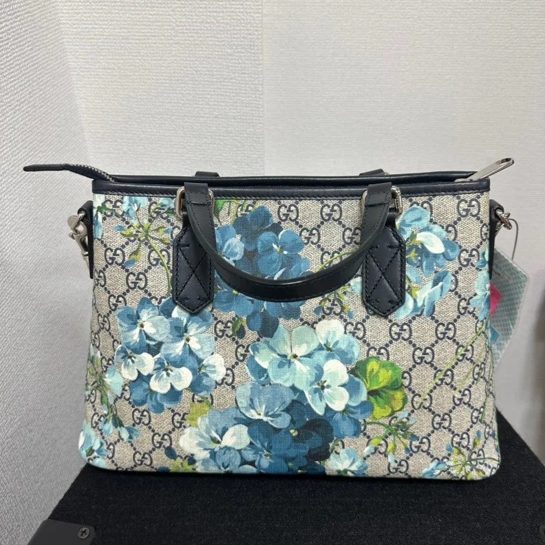 Women Gucci crossbody bags with a woven leather strapGucci GG Supreme Blooms Reversible Tote,Blue,Canvas