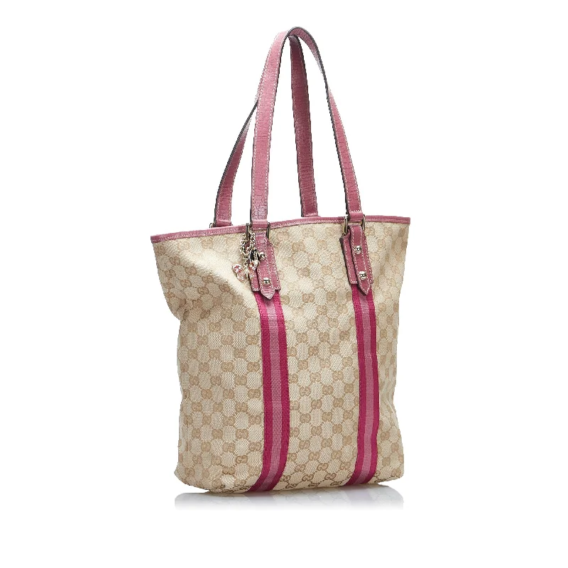 Women Gucci Sylvie bags with a leather - wrapped handleBrown Gucci GG Canvas Jolicoeur Tote