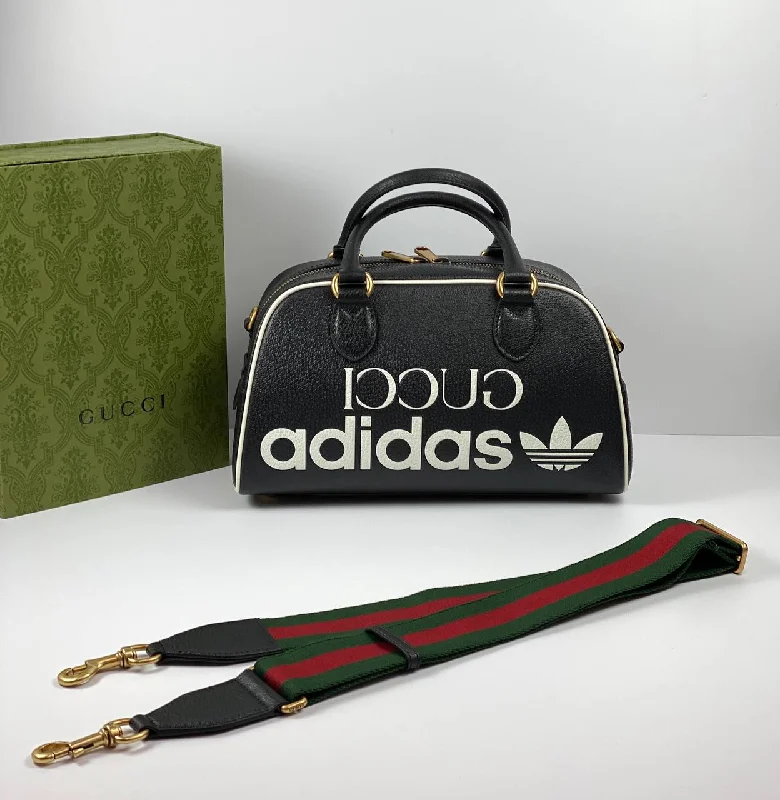 Women Gucci bags with a front - flap pocket for quick - access itemsGucci x adidas mini duffle bag