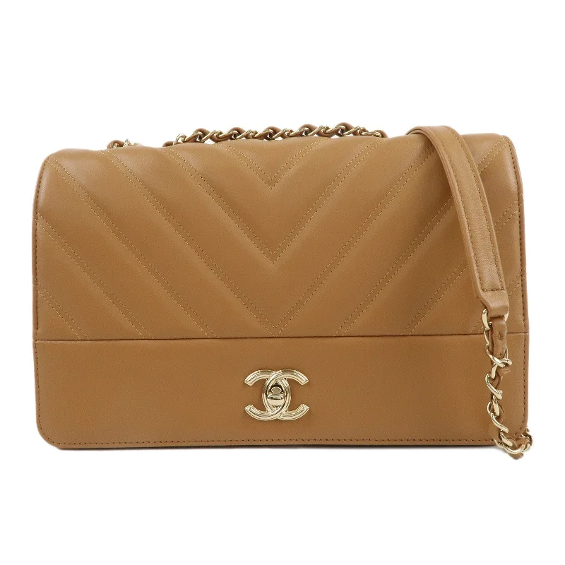 Chanel Quilted Leather Shoulder Bag for FashionistasCHANEL Chevron Lamb Skin COCO Mark Chain Shoulder Bag Beige