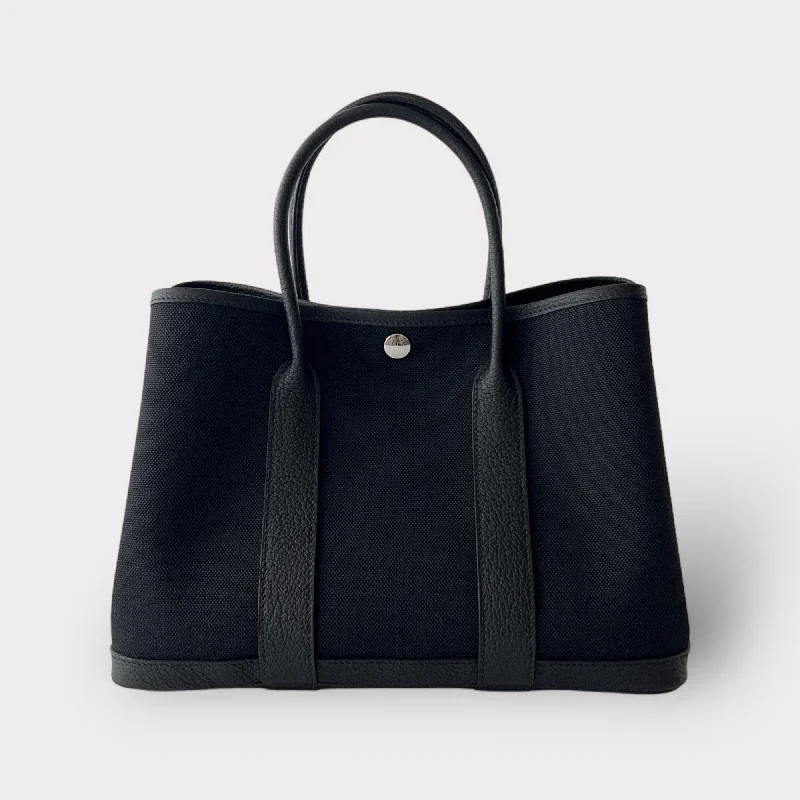 Color - Blocked Hermes Bags for a Bold Fashion StatementHermès Garden Party 30 Bag In Black Canvas, Palladium Hardware