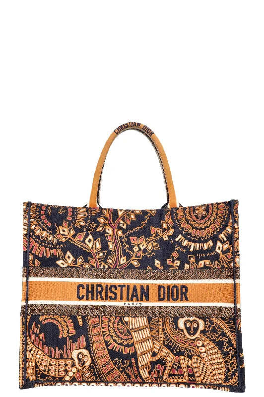 Christian Dior tote bags with a printed Dior logo on the frontCHRISTIAN DIOR Animal Book Tote Large Monkey