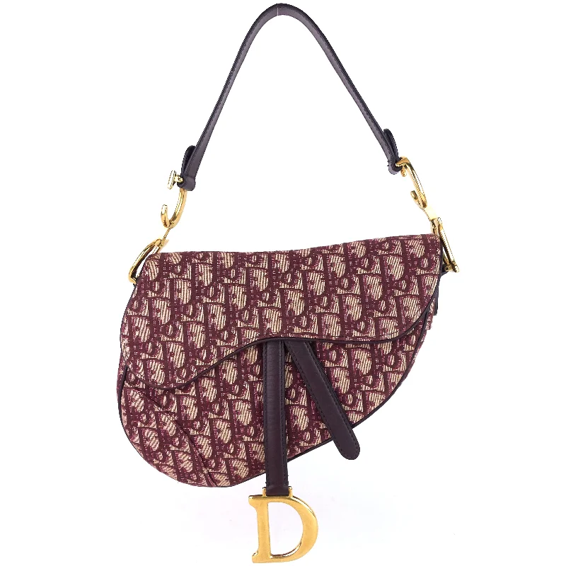 Christian Dior tote bags with a printed Dior logo on the frontRed Oblique Jacquard Saddle Bag