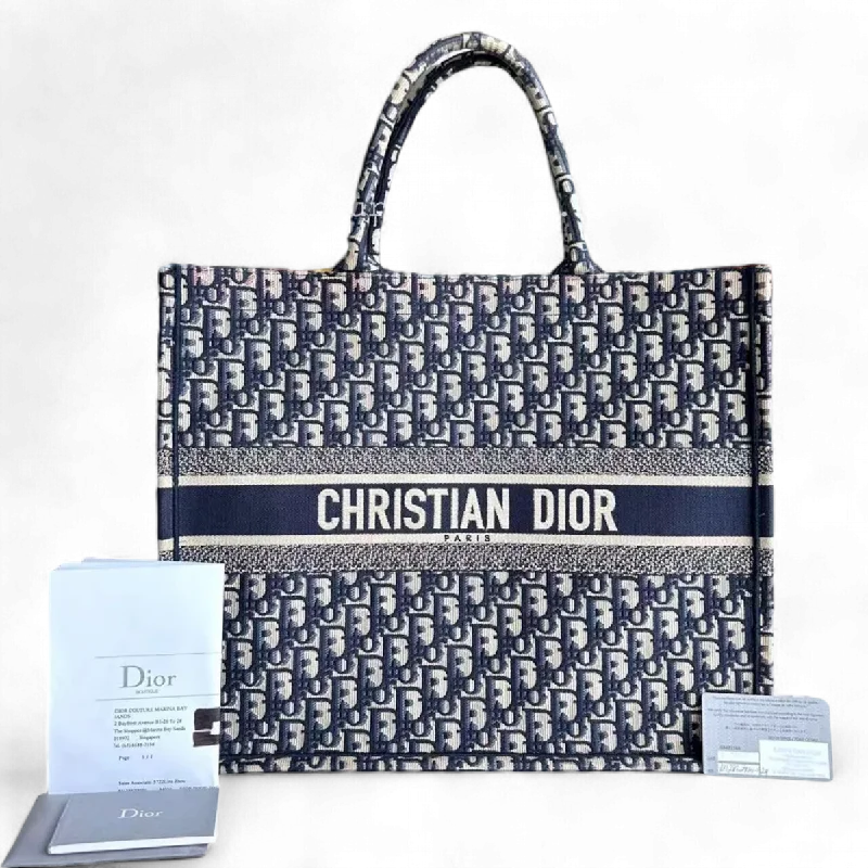 Christian Dior tote bags with a printed Dior logo on the frontDior Book Tote - Large Canvas Monogram Dark Blue