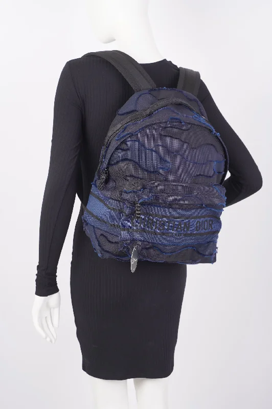 Christian Dior bags with a quilted pattern and gold - toned hardwareChristian Dior Dior Travel Backpack Black / Navy Cotton