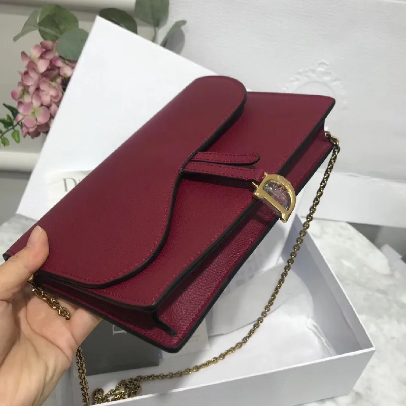 Christian Dior bags with a zip - top closure and multiple compartmentsChristian Dior Bordeaux Calskin Saddle Chain Clutch