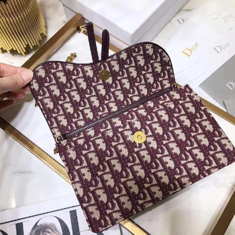 Christian Dior handbags with a snap - button closure and a decorative buckleChristian Dior Bordeaux Oblique Saddle Chain Clutch