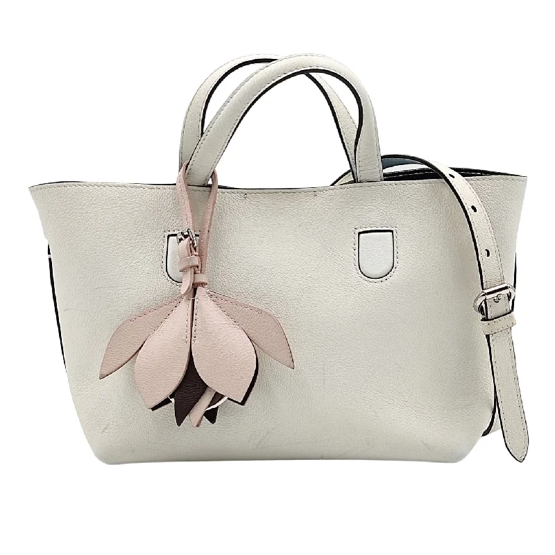 Christian Dior bags with a side - pocket for holding a water bottleChristian Dior Christian Blossom mini shoulder bag in white leather