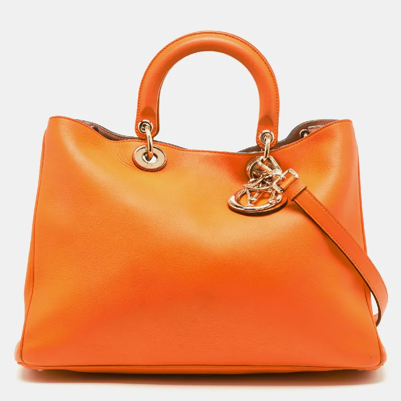 Christian Dior bags with a side - pocket for holding a water bottleDIOR Orange Leather Large issimo Shopper Tote