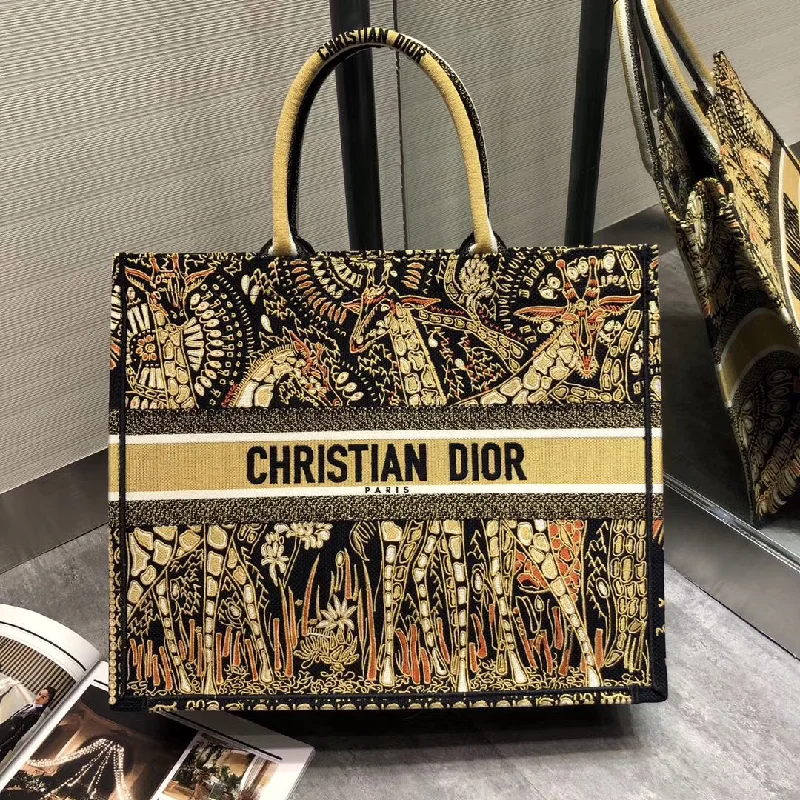 Christian Dior tote bags with a printed Dior logo on the frontChristian Dior Book Tote Bag In Yellow Animals Embroidered Canvas